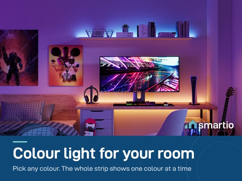 Govee RGB LED Strip Light glowing purple around a desk and shelves