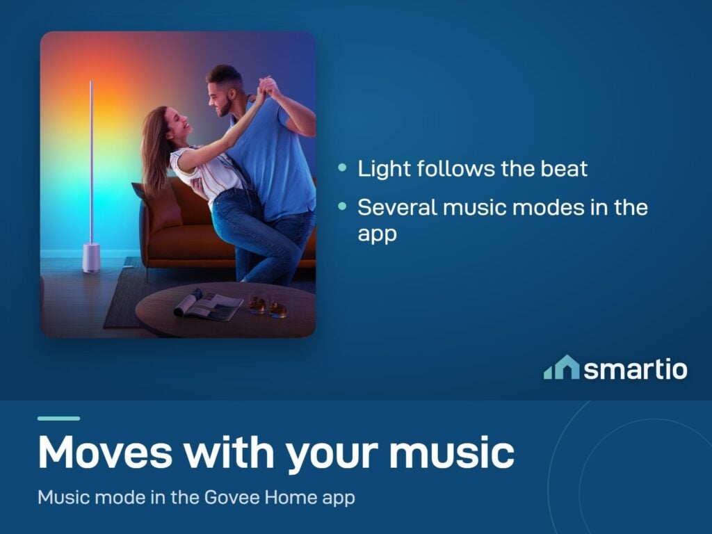 A couple dancing in a room lit by a Govee Lyra floor lamp in music mode
