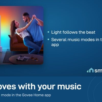 A couple dancing in a room lit by a Govee Lyra floor lamp in music mode