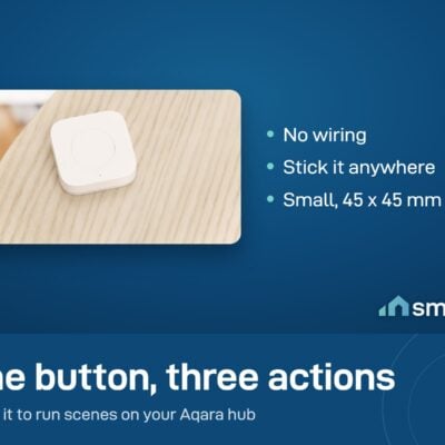 Aqara Wireless Mini Switch, a small white button, resting on a wooden table