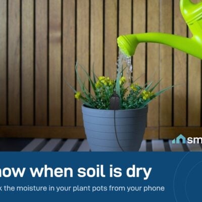 Sonoff MS01 soil moisture probe in a plant pot while it is watered. It plugs into a TH Elite or TH Origin