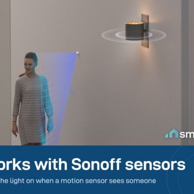 Light turning on as a woman walks past a motion sensor
