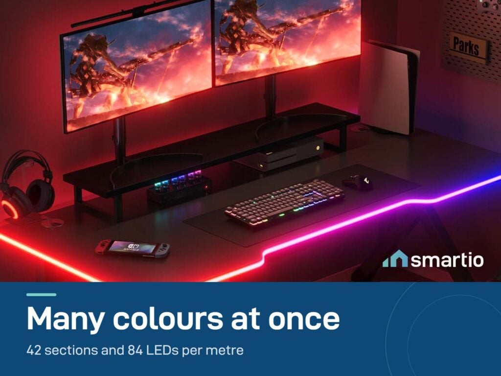 Govee desk neon rope light showing several colours along a gaming desk