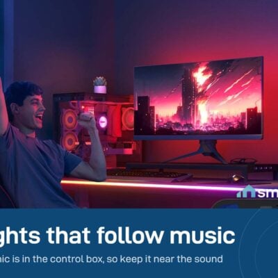 Person cheering at a gaming desk with the Govee neon rope light following the music