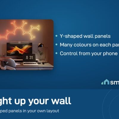 Govee Glide Y Lights: warm orange Y-shaped light panels on the wall above a desk