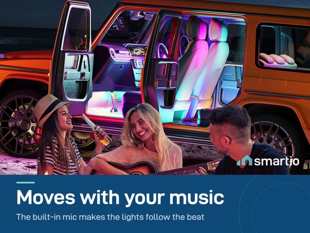 Govee Car LED Lights glowing while friends play music by a campfire
