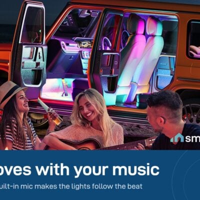 Govee Car LED Lights glowing while friends play music by a campfire