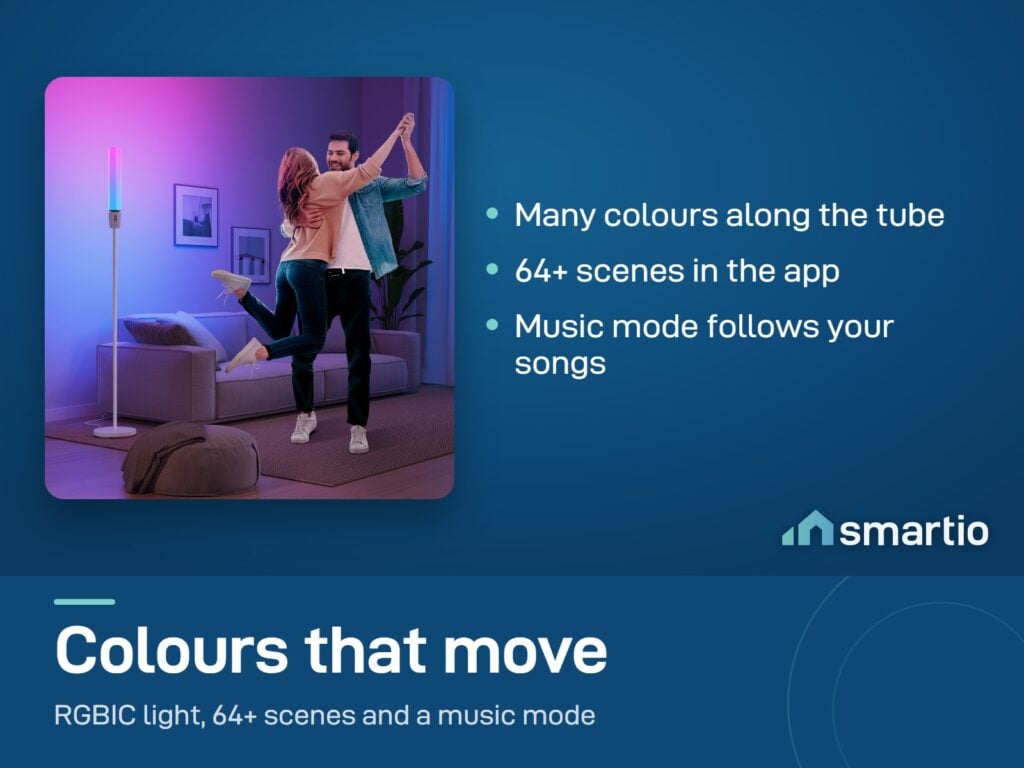 A couple dancing in a purple living room lit by a Govee Cylinder Floor Lamp