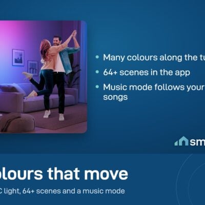 A couple dancing in a purple living room lit by a Govee Cylinder Floor Lamp