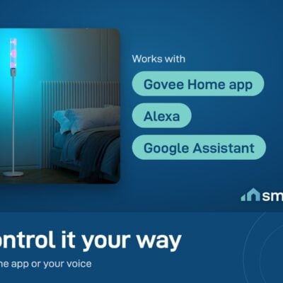 Govee Cylinder Floor Lamp glowing blue in a bedroom; works with the Govee Home app, Alexa and Google Assistant