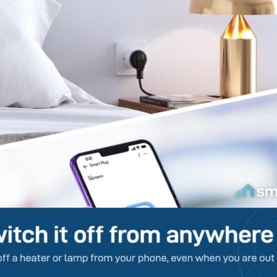 Sonoff S60 smart plug beside a bedside lamp, controlled from a phone