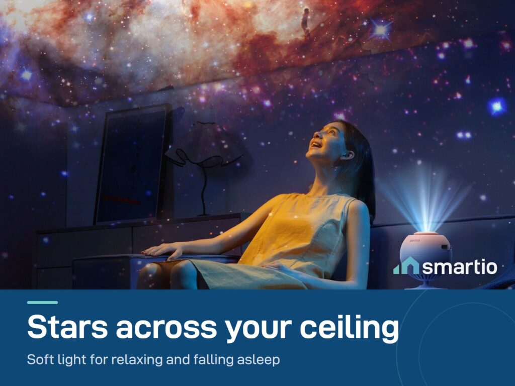 POCOCO Galaxy Star Projector lighting a room with a galaxy on the ceiling while a woman relaxes