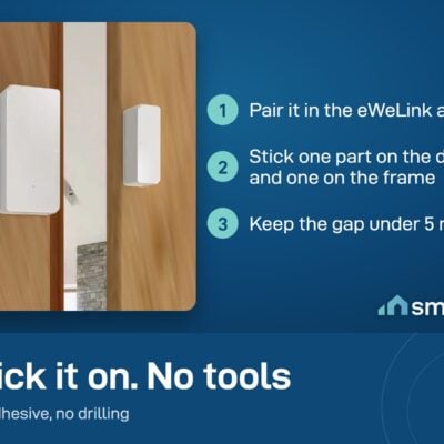 Sonoff DW2 door sensor stuck on a wooden door and frame with adhesive