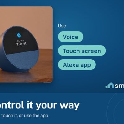 Amazon Echo Spot in blue showing an alarm on its screen; control it by voice, touch screen or the Alexa app
