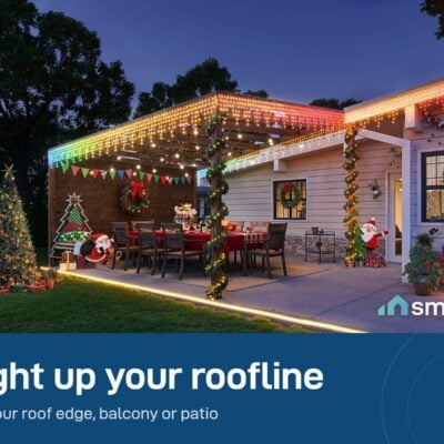 Govee Icicle Lights glowing in rainbow colours along a patio roofline at dusk