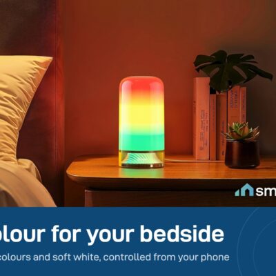 Govee RGBIC Table Lamp 2 glowing in rainbow colours on a bedside table