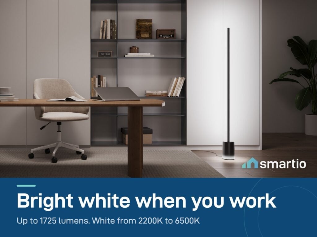 Govee Floor Lamp 2 giving bright white light beside a desk; up to 1725 lumens