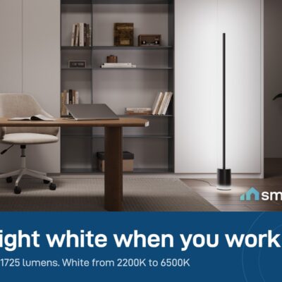 Govee Floor Lamp 2 giving bright white light beside a desk; up to 1725 lumens
