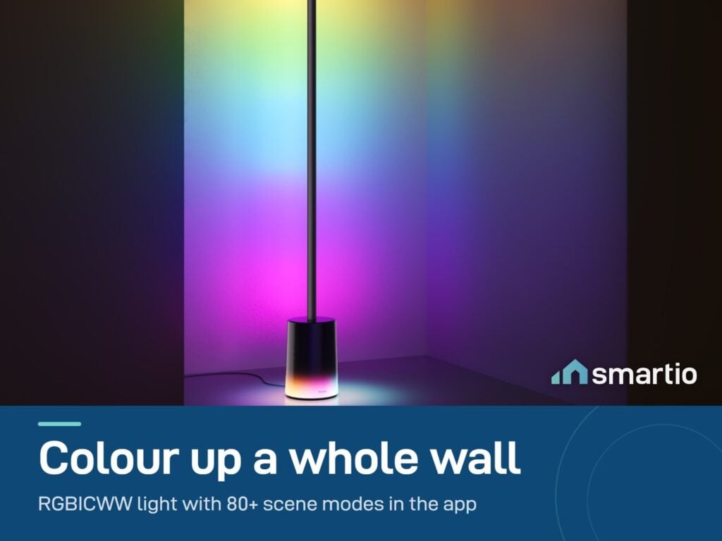 Govee Floor Lamp 2 in a room corner lighting the walls in rainbow colours