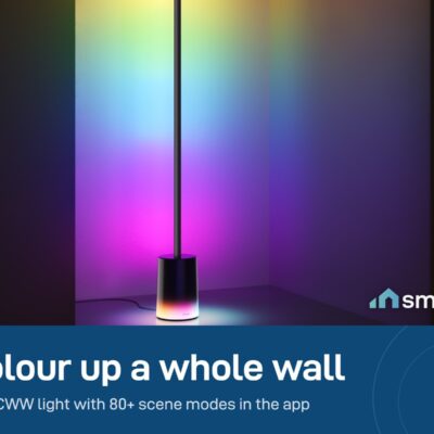 Govee Floor Lamp 2 in a room corner lighting the walls in rainbow colours