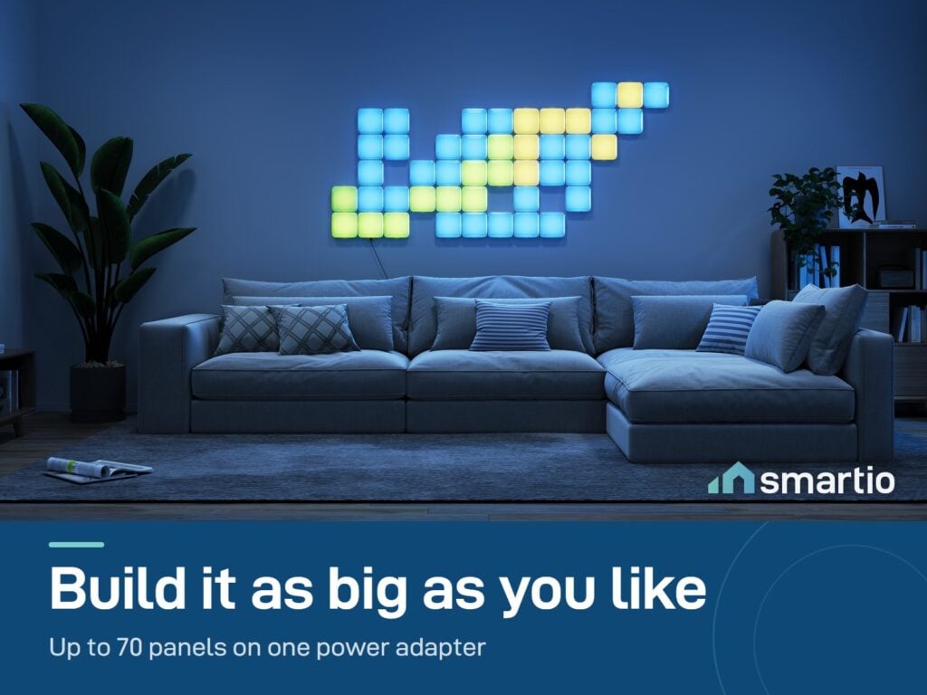 Large Govee Mini Panel Lights pixel art on a living room wall above a sofa