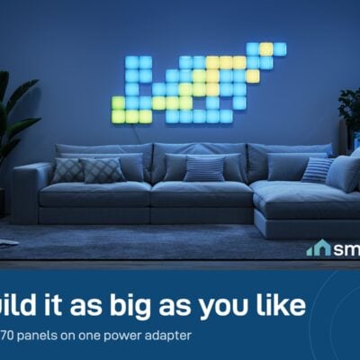 Large Govee Mini Panel Lights pixel art on a living room wall above a sofa