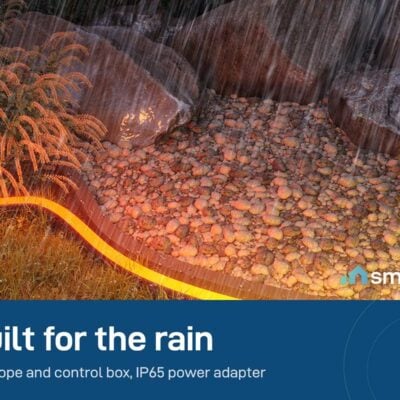 Govee outdoor neon rope light glowing along a garden path in heavy rain