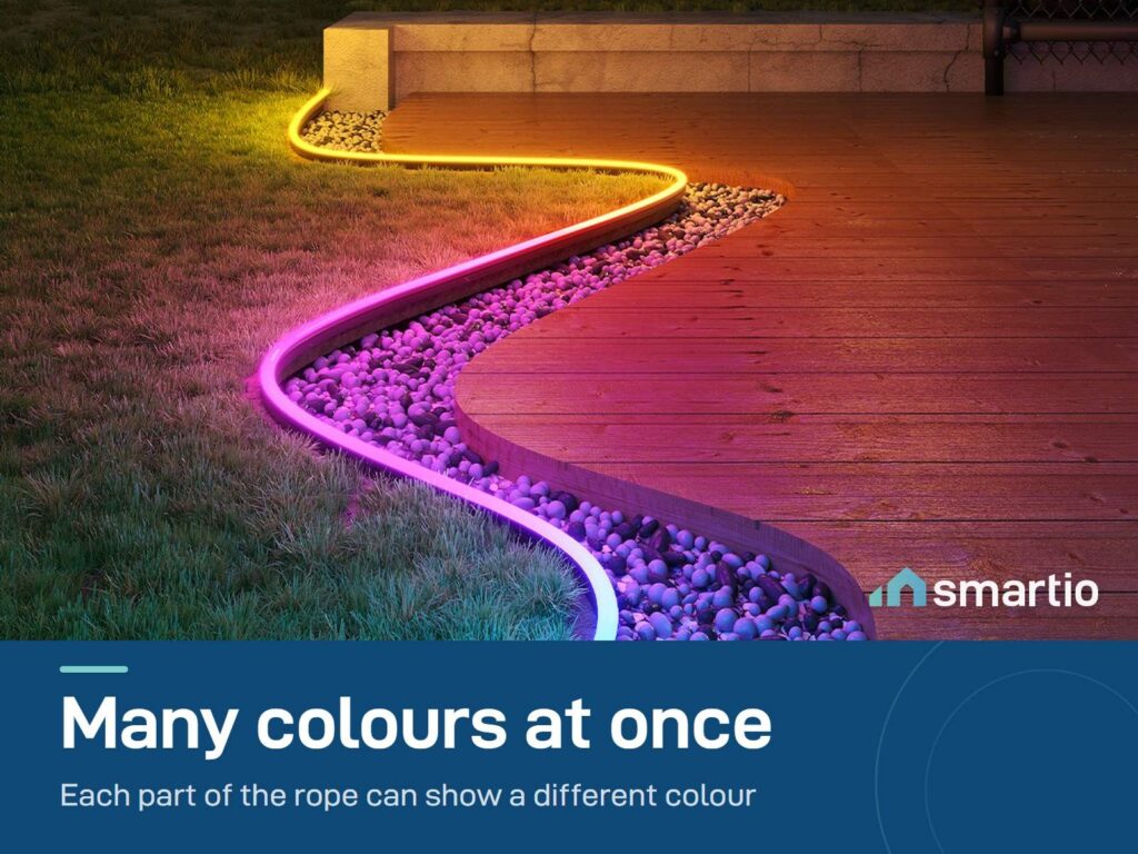 Govee outdoor neon rope light showing several colours at once along a garden path