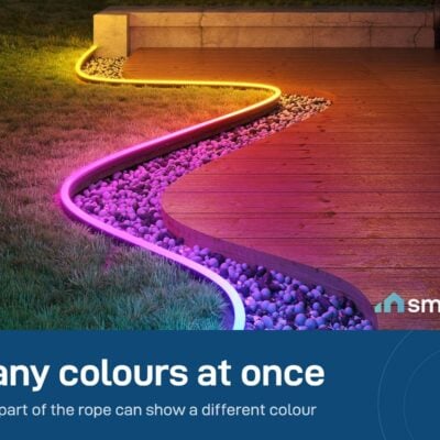 Govee outdoor neon rope light showing several colours at once along a garden path
