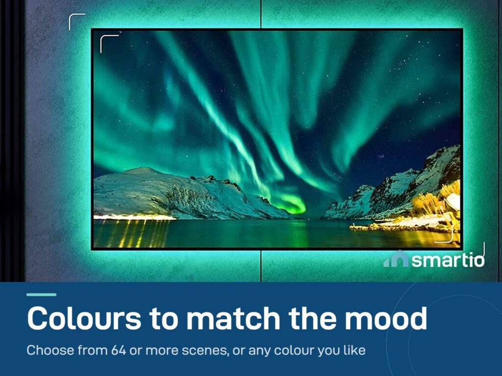 TV with the Govee Bluetooth backlight glowing orange on the wall behind it