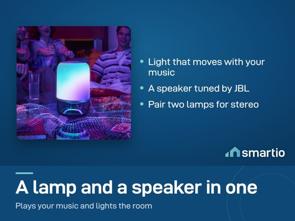 Friends around a table with the Govee Table Lamp 2 Pro x Sound by JBL glowing while it plays music