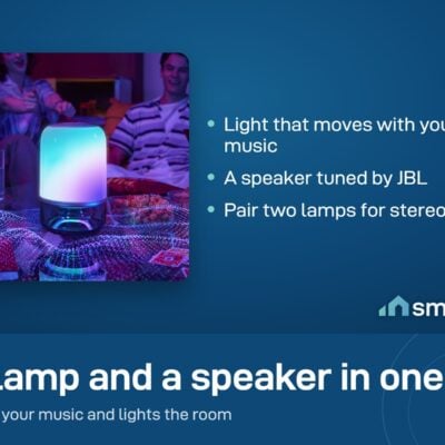 Friends around a table with the Govee Table Lamp 2 Pro x Sound by JBL glowing while it plays music
