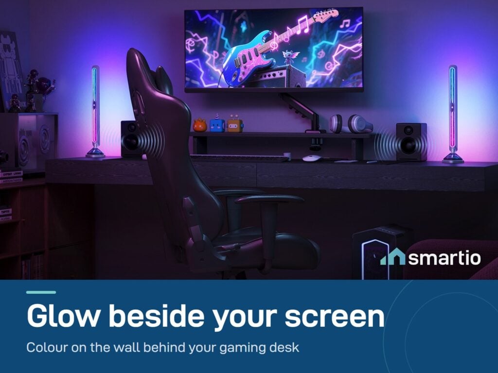 Govee Gaming Light Bars Pro standing on both sides of a monitor and lighting a gaming room in purple and blue