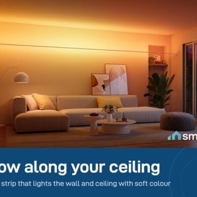 Govee Skyline strip light glowing warm orange along the ceiling line of a living room