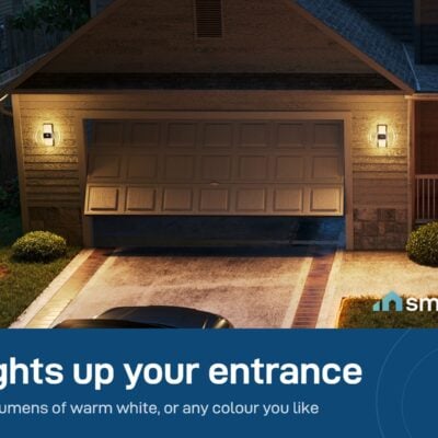 Govee Smart Outdoor Wall Lights beside a garage door at night