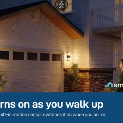 Govee Smart Outdoor Wall Light turning on as a man walks to his house