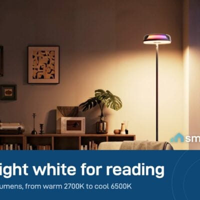 Govee Uplighter Floor Lamp giving warm white reading light in a living room