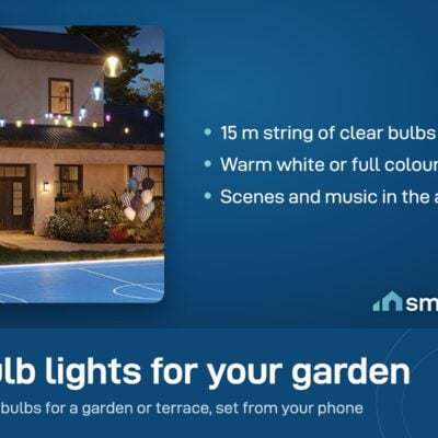 Govee Outdoor Clear Bulb String Lights hung over a garden, terrace and pool court at night