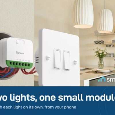 Sonoff MINI Duo module in the wall box behind a two-gang wall switch, with two pendant lights in a dining room