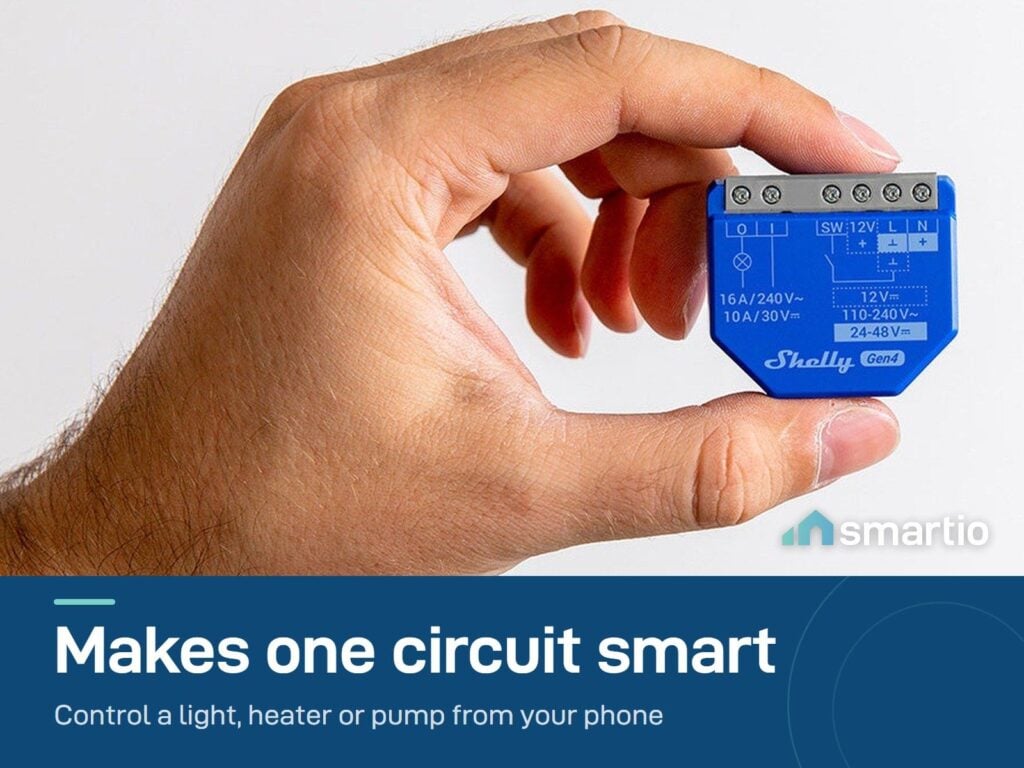 Shelly 1 Gen4 relay module held in one hand