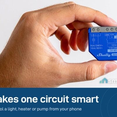Shelly 1 Gen4 relay module held in one hand