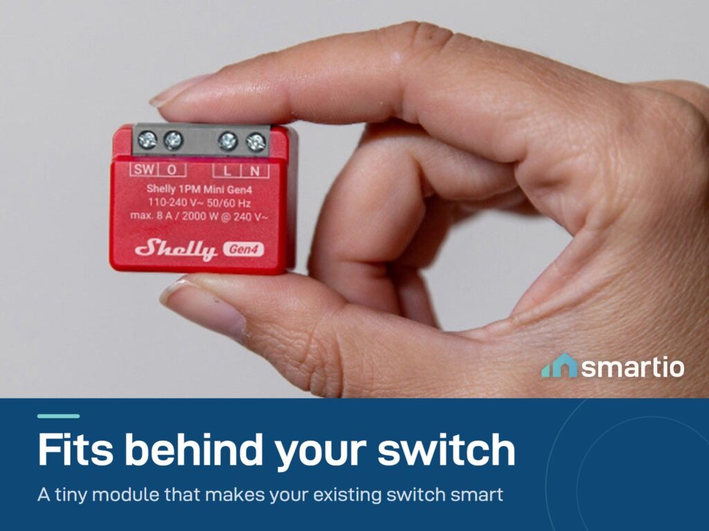 Shelly 1PM Mini Gen4 held between two fingers