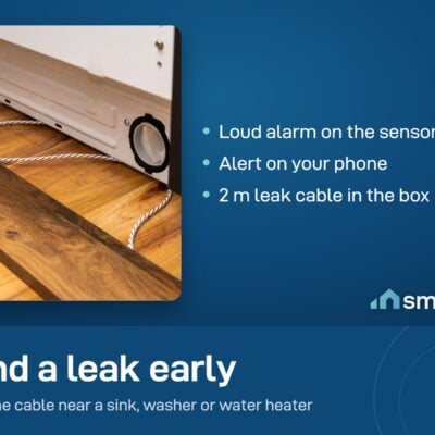 Shelly Flood Gen4 leak cable lying along the floor beside a washing machine