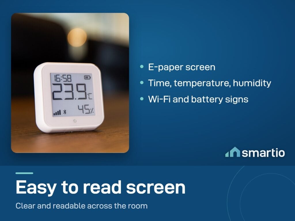 Shelly H&T Gen3 e-paper screen on a table showing the time, temperature and humidity
