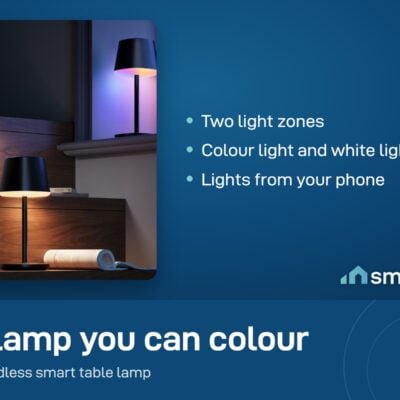 Govee Cordless Smart Table Lamp Classic glowing in colour on a shelf in a dark room