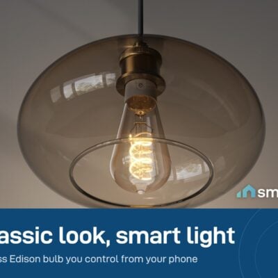 Govee Smart Edison Bulb glowing warm inside a glass pendant lamp