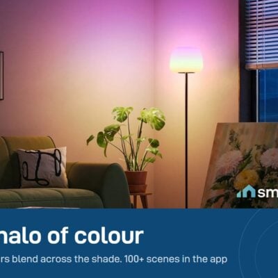 Govee floor lamp lighting a living room with a purple and pink glow; 100+ scene modes